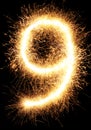 Sparkler firework light number 9 isolated on black Royalty Free Stock Photo