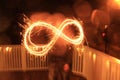 Sparkler forming an infinity sign/symbol Royalty Free Stock Photo