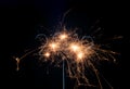 Sparkler isolated on black, 2019