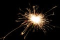 Sparkler lit in the dark Royalty Free Stock Photo