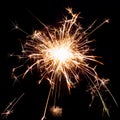 Sparklers on black isolated background. Sparks from a burning sparkler. To insert an image in a blend mode Royalty Free Stock Photo