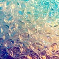 Sparkling abstract texture of bubble wrap with iridescent light effects and bokeh Royalty Free Stock Photo