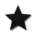Sparkling Black Star Shape Against White Background with Soft Shadow Royalty Free Stock Photo