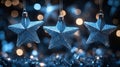 Sparkling Blue Star Ornaments on Festive Christmas Background Royalty Free Stock Photo