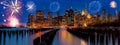 Sparkling celebration fireworks New York City Manhattan skyline with skyscrapers over Hudson River illuminated lights at dusk afte Royalty Free Stock Photo