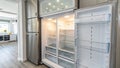 Sparkling Clean Empty Refrigerator Interior Pristine LED Lighting Showcase for a Bright Modern Kitchen Royalty Free Stock Photo