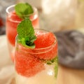 Sparkling cocktail with watermelon and melon ball-shaped pieces and ice Royalty Free Stock Photo