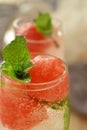 Sparkling cocktail with watermelon and melon ball-shaped pieces and ice Royalty Free Stock Photo