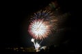 Golden explosion of fireworks and salute, isolated and blurred on black background, element for design Royalty Free Stock Photo