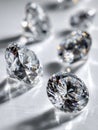 Sparkling faceted gemstones reflecting light and casting intricate shadows on a smooth white surface in a bright and elegant Royalty Free Stock Photo