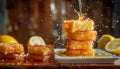 Sparkling Fresh Honey Pouring Over a Stack of Golden Crispy Toast Served with Lemon Slices on a Wooden Table Royalty Free Stock Photo