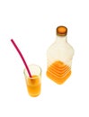 Sparkling fruit juices in glasses and bottles