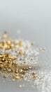 Sparkling gold and silver glitter scattered on surface Royalty Free Stock Photo