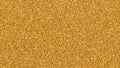 Sparkling golden glitter texture background with shimmering particles Royalty Free Stock Photo