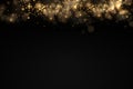 Sparkling golden magic dust particles bokeh light. Royalty Free Stock Photo