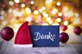 Sparkling Lights, Ball, Red Santa Hat, Danke Means Thank You Royalty Free Stock Photo