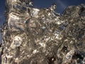 Sparkling melting ice  background with frosty pattern and sun light Royalty Free Stock Photo