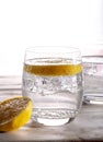 Sparkling mineral drink water in glasses served on table with le