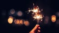 Sparkling Moments Hand Holding Burning Sparkler Blast on Black Bokeh Background, Igniting Holiday Celebration Event Party with