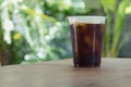 Sparkling Nitro Cold Brew Coffee in take away cup.