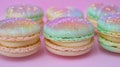 Sparkling Pastel Macarons on a Pink Background