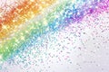 Sparkling rainbow-colored sparkles cascading gently