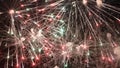 Sparkling red green yellow celebration fireworks over starry sky. Close-up. Independence Day, 4th of July, New Year holidays Royalty Free Stock Photo