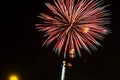 Sparkling red green yellow celebration fireworks over starry sky. Independence Day, 4th of July, New Year Royalty Free Stock Photo