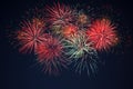 Sparkling red green yellow fireworks over starry sky Royalty Free Stock Photo