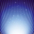 Sparkling stars on blue light burst Royalty Free Stock Photo