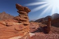 The sparkling sun above forms of sandstone Royalty Free Stock Photo