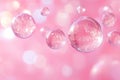 Sparkling, transparent bubbles float against a soft pink backdrop with a bokeh effect, creating a dreamy and ethereal atmosphere