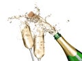 Sparkling wine splashing out of bottle and glasses on white background Royalty Free Stock Photo