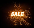 Sparkly blocky Sale word on dark background.