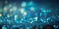 Sparkly blue glitter sequins unfocused bokeh background. Teal sparkle tinsel floating in the air.