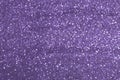 Sparkly glitter, dark purple background bokeh effect Royalty Free Stock Photo