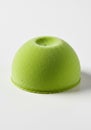 Sparkly Green Dome Shaped Dessert on White Background Royalty Free Stock Photo