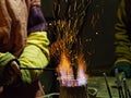 Sparks of blacksmith and fire at night Royalty Free Stock Photo