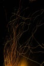 Sparks from a fire against dark night. Bonfire Royalty Free Stock Photo