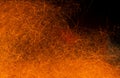 Sparks of fire on a black. Abstract background with fire sparks Royalty Free Stock Photo