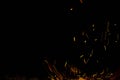 Sparks and fire on a black background Royalty Free Stock Photo