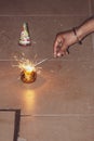 Sparks of the fire coming out of the sparkler to burn the crackers during the festivals, celebration, diwali christmas