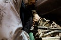 Sparks Fly as a Mechanic Performs Precision Welding on Automotive Components