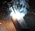 Sparks and jets of smoke when welding Royalty Free Stock Photo