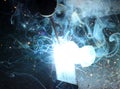 Sparks and jets of smoke when welding Royalty Free Stock Photo