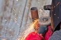 Sparks when machining a weld bead on the pipe Royalty Free Stock Photo