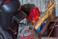 Sparks when machining a weld bead on the pipe Royalty Free Stock Photo