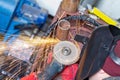 Sparks when machining a weld bead on the pipe Royalty Free Stock Photo