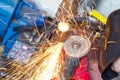 Sparks when machining a weld bead on the pipe Royalty Free Stock Photo