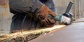 Sparks when machining a weld bead on the pipe Royalty Free Stock Photo